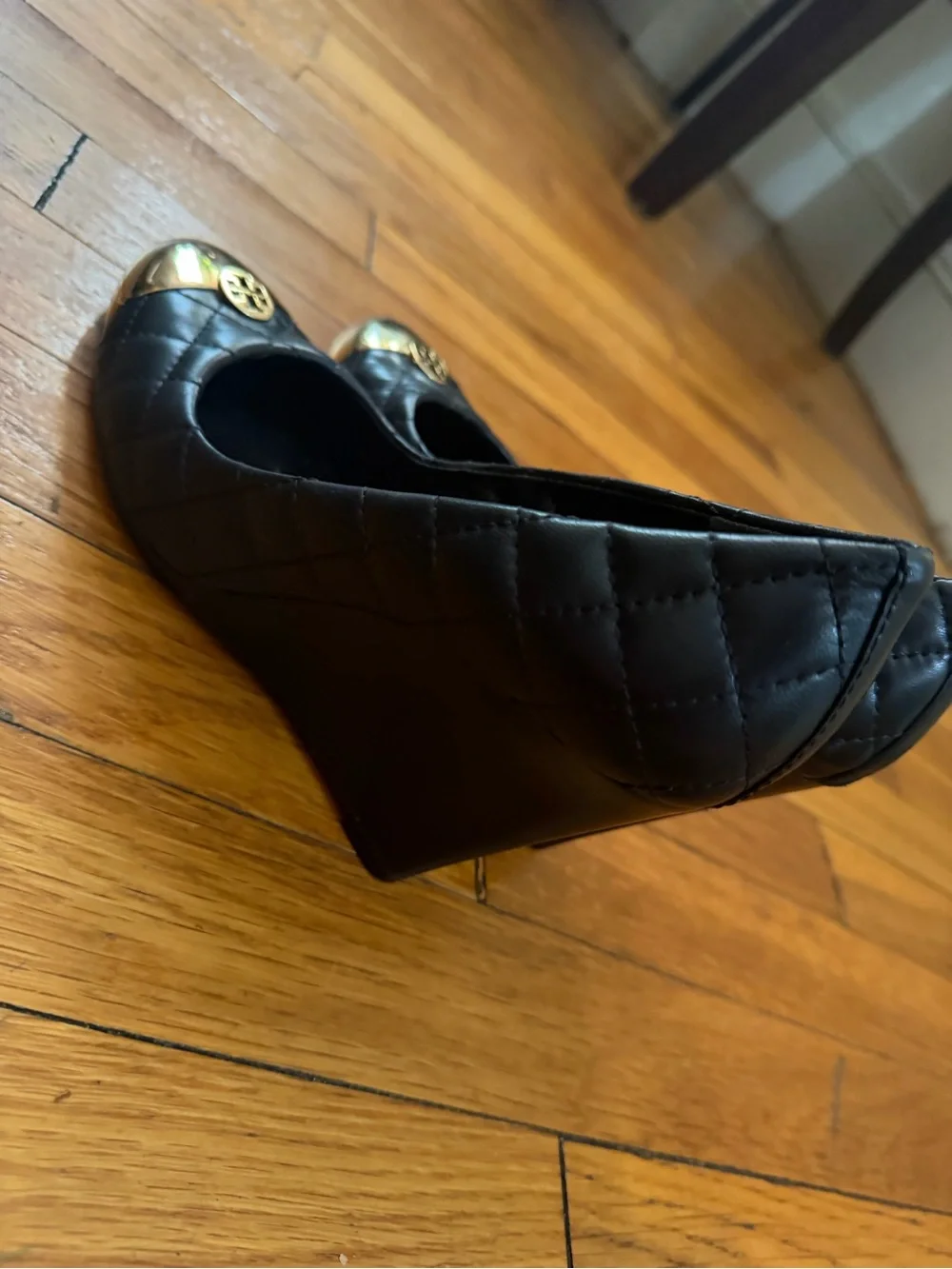 Tory Burch Black Quilted Leather Pumps with Gold Toe Cap Accent
